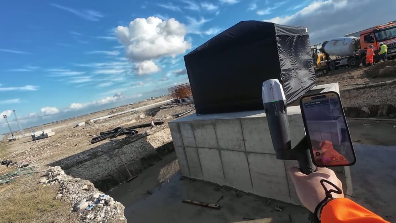 PIX4Dcatch with a GNSS receiver capturing a concrete substation foundation.
